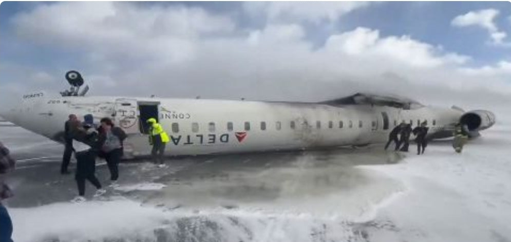 Delta airplane overturned at Toronto Pearson Airport; Strong winds suspected cause
